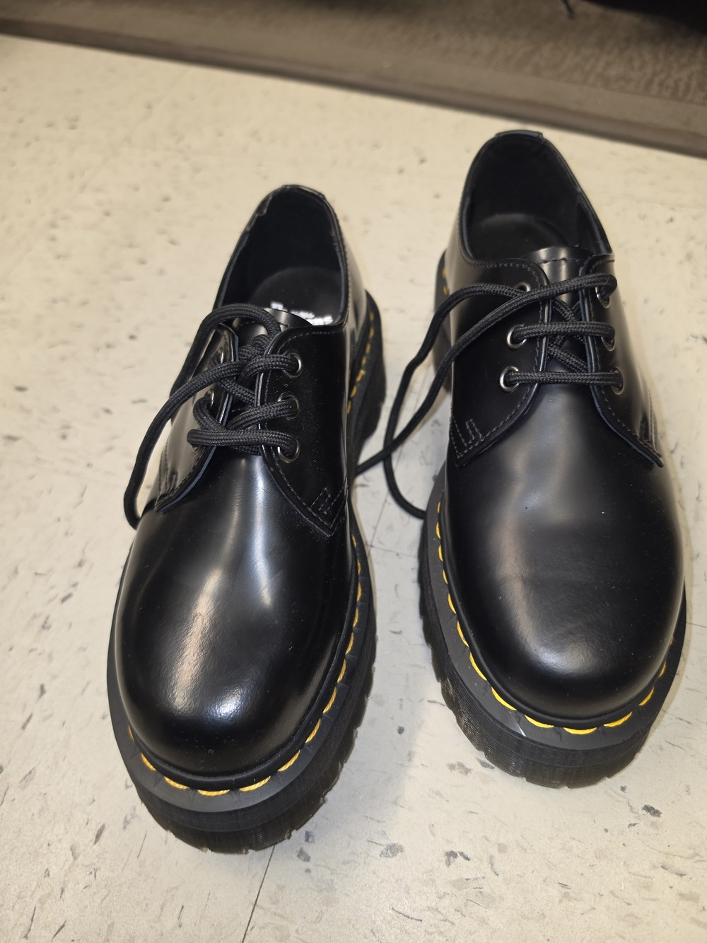 Dr. Martens Black Leather Platform Shoes with Yellow Stitching
